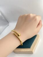 ⁦أسوارة المسمار العريضة ذهب21k مقاس15✨⁩ - الصورة ⁦2⁩